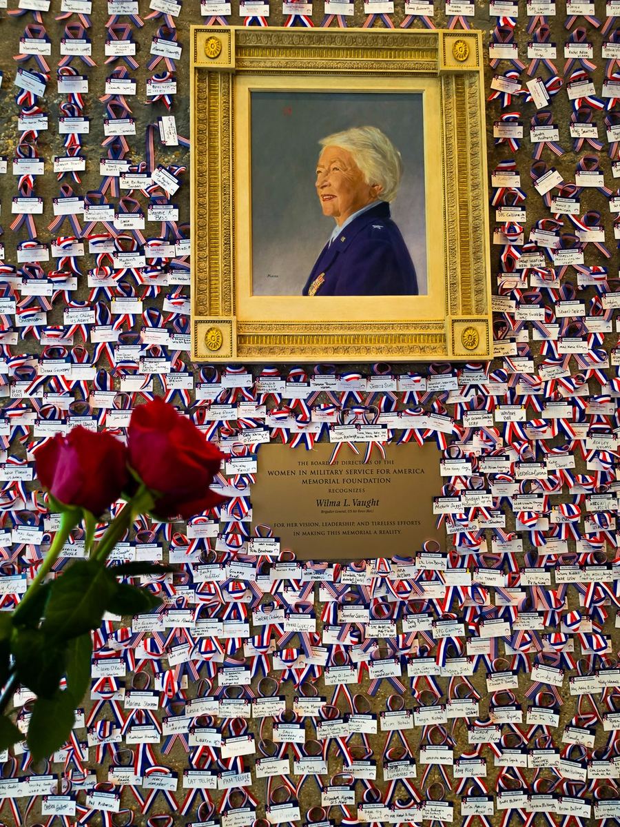 The Women in Military Service for America Memorial wall, covered in ribbons recognizing service members